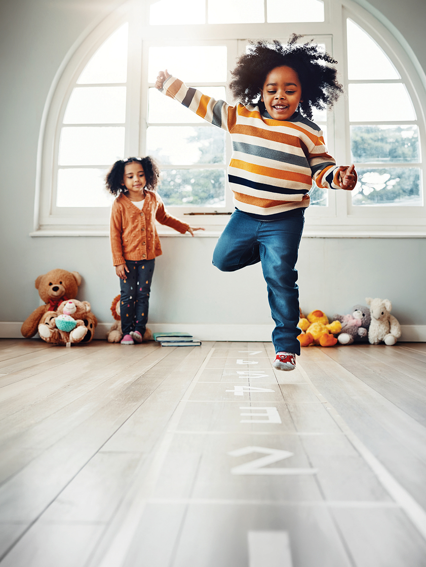 Kid playing on new Luxury Vinyl Flooring