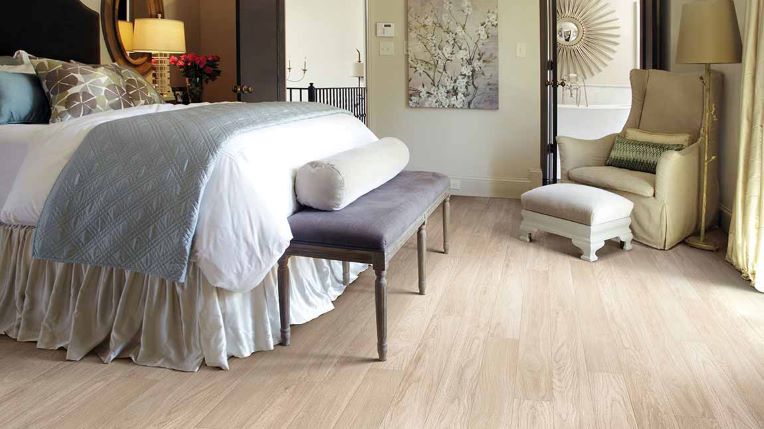 wood look laminate flooring in a bedroom
