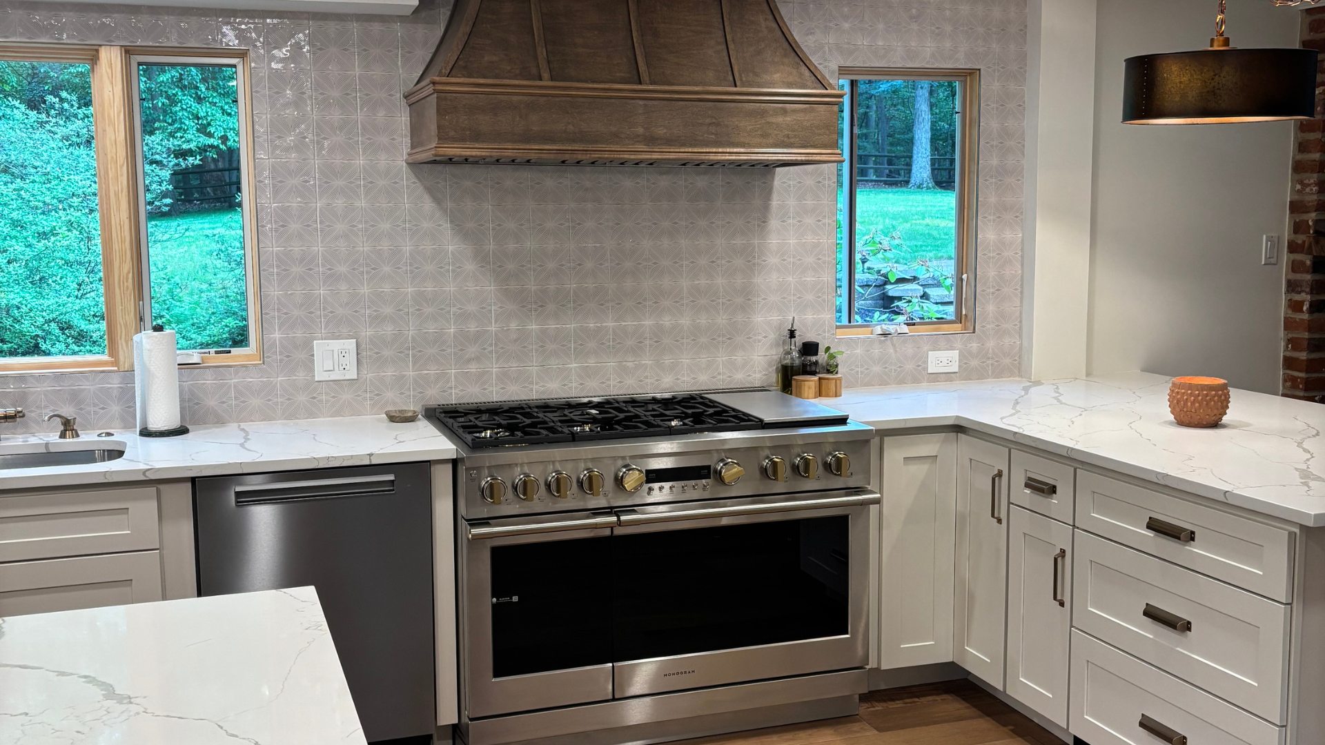 Kitchen remodel featuring decorative wall tile